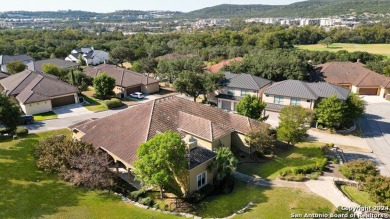 This charming two bedroom/two bath Mediterranean-style garden on The Dominion Country Club in Texas - for sale on GolfHomes.com, golf home, golf lot