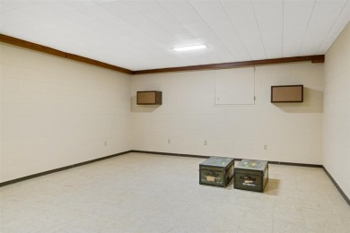 Mid-century modern classic, designed by renowned Charlevoix on Charlevoix Golf Club in Michigan - for sale on GolfHomes.com, golf home, golf lot