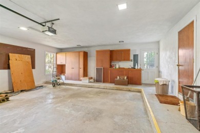 Mid-century modern classic, designed by renowned Charlevoix on Charlevoix Golf Club in Michigan - for sale on GolfHomes.com, golf home, golf lot