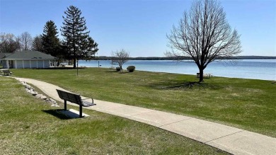 Mid-century modern classic, designed by renowned Charlevoix on Charlevoix Golf Club in Michigan - for sale on GolfHomes.com, golf home, golf lot