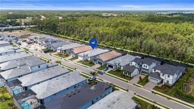Live the unparalleled lakefront lifestyle you've always dreamed on Naples National Golf Club in Florida - for sale on GolfHomes.com, golf home, golf lot