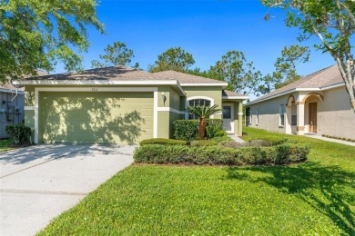 THIS GATED GOLF COMMUNITY HOME IS SITUATED ON THE 13TH HOLE OF on Plantation Palms Golf Club in Florida - for sale on GolfHomes.com, golf home, golf lot