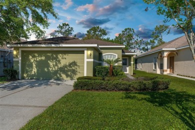 THIS GATED GOLF COMMUNITY HOME IS SITUATED ON THE 13TH HOLE OF on Plantation Palms Golf Club in Florida - for sale on GolfHomes.com, golf home, golf lot