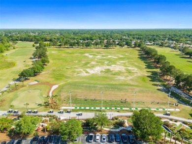 THIS GATED GOLF COMMUNITY HOME IS SITUATED ON THE 13TH HOLE OF on Plantation Palms Golf Club in Florida - for sale on GolfHomes.com, golf home, golf lot