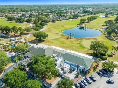 THIS GATED GOLF COMMUNITY HOME IS SITUATED ON THE 13TH HOLE OF on Plantation Palms Golf Club in Florida - for sale on GolfHomes.com, golf home, golf lot