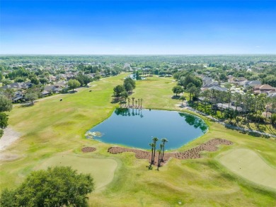 THIS GATED GOLF COMMUNITY HOME IS SITUATED ON THE 13TH HOLE OF on Plantation Palms Golf Club in Florida - for sale on GolfHomes.com, golf home, golf lot