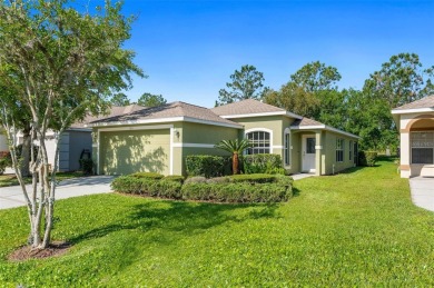 THIS GATED GOLF COMMUNITY HOME IS SITUATED ON THE 13TH HOLE OF on Plantation Palms Golf Club in Florida - for sale on GolfHomes.com, golf home, golf lot