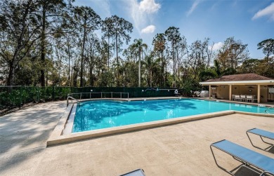 Enjoy gorgeous views and maintenance free living with this much on East Lake Woodlands Country Club in Florida - for sale on GolfHomes.com, golf home, golf lot