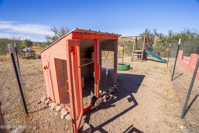 Very nice, Santa Fe style home in beautiful Kino Springs !  It on Kino Springs Country Club in Arizona - for sale on GolfHomes.com, golf home, golf lot