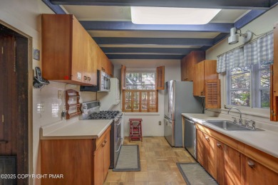''Hemlock Lodge'' is a charming 4-bedroom cottage filled with on Buck Hill Golf Club  in Pennsylvania - for sale on GolfHomes.com, golf home, golf lot