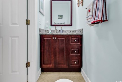 This 4-bedroom, 2.5-bath home in the coveted LinksBrook on TPC of Myrtle Beach in South Carolina - for sale on GolfHomes.com, golf home, golf lot