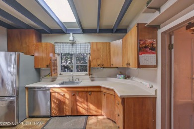 ''Hemlock Lodge'' is a charming 4-bedroom cottage filled with on Buck Hill Golf Club  in Pennsylvania - for sale on GolfHomes.com, golf home, golf lot