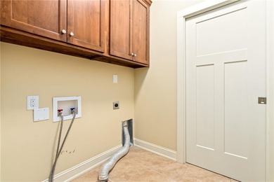 Discover the perfect balance of a serene, low-maintenance home on Grand National Golf Course in Alabama - for sale on GolfHomes.com, golf home, golf lot