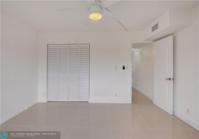 FULLY RENOVATED 2/2 IN THE WYNMOOR GOLF COMMUNITY. THE KITCHEN on Wynmoor Golf Course in Florida - for sale on GolfHomes.com, golf home, golf lot
