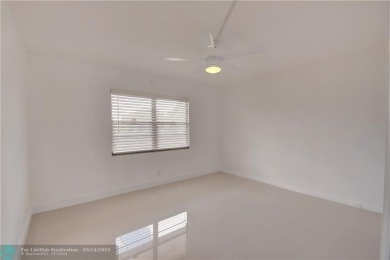 FULLY RENOVATED 2/2 IN THE WYNMOOR GOLF COMMUNITY. THE KITCHEN on Wynmoor Golf Course in Florida - for sale on GolfHomes.com, golf home, golf lot