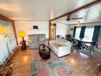 This home is located in a 55+ community!! This home has been on Lone Palm Golf Club in Florida - for sale on GolfHomes.com, golf home, golf lot