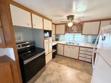 This home is located in a 55+ community!! This home has been on Lone Palm Golf Club in Florida - for sale on GolfHomes.com, golf home, golf lot