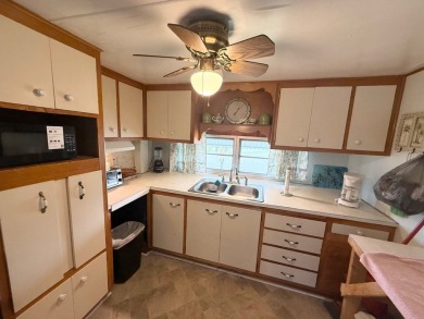 This home is located in a 55+ community!! This home has been on Lone Palm Golf Club in Florida - for sale on GolfHomes.com, golf home, golf lot