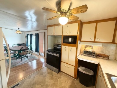 This home is located in a 55+ community!! This home has been on Lone Palm Golf Club in Florida - for sale on GolfHomes.com, golf home, golf lot