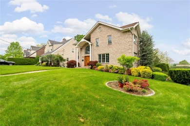 This elegant full-brick colonial sits on a prominent corner lot on Leewood Golf Club in New York - for sale on GolfHomes.com, golf home, golf lot