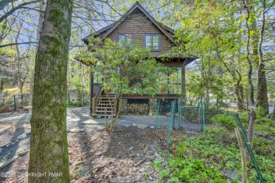 ''Hemlock Lodge'' is a charming 4-bedroom cottage filled with on Buck Hill Golf Club  in Pennsylvania - for sale on GolfHomes.com, golf home, golf lot