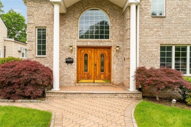 This elegant full-brick colonial sits on a prominent corner lot on Leewood Golf Club in New York - for sale on GolfHomes.com, golf home, golf lot