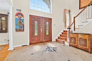 This elegant full-brick colonial sits on a prominent corner lot on Leewood Golf Club in New York - for sale on GolfHomes.com, golf home, golf lot
