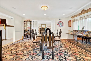 This elegant full-brick colonial sits on a prominent corner lot on Leewood Golf Club in New York - for sale on GolfHomes.com, golf home, golf lot