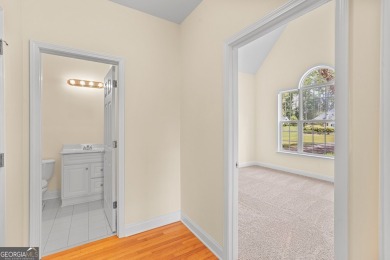 Discover the perfect blend of comfort and scenic beauty at on The Club at Shoal Creek Golf Course in Georgia - for sale on GolfHomes.com, golf home, golf lot