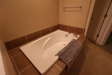 Vaulted ceilings and inspired, open floorplan 4 bedroom 3 full on Eagle Bend Golf Course in Montana - for sale on GolfHomes.com, golf home, golf lot