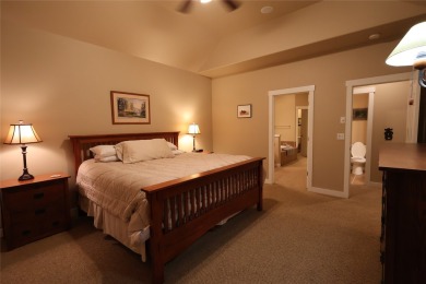 Vaulted ceilings and inspired, open floorplan 4 bedroom 3 full on Eagle Bend Golf Course in Montana - for sale on GolfHomes.com, golf home, golf lot