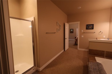 Vaulted ceilings and inspired, open floorplan 4 bedroom 3 full on Eagle Bend Golf Course in Montana - for sale on GolfHomes.com, golf home, golf lot