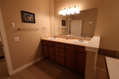 Vaulted ceilings and inspired, open floorplan 4 bedroom 3 full on Eagle Bend Golf Course in Montana - for sale on GolfHomes.com, golf home, golf lot