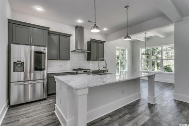 Welcome to this stunning new construction home in the on Wild Wing Plantation in South Carolina - for sale on GolfHomes.com, golf home, golf lot