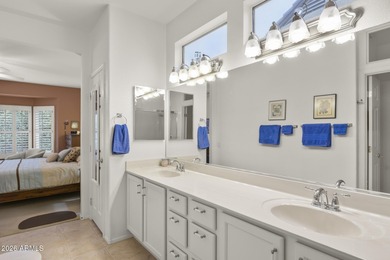 Welcoming one-owner home featuring a charming front courtyard on Sun City Grand Golf Couse and Club in Arizona - for sale on GolfHomes.com, golf home, golf lot