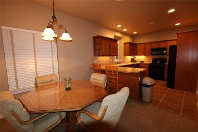Vaulted ceilings and inspired, open floorplan 4 bedroom 3 full on Eagle Bend Golf Course in Montana - for sale on GolfHomes.com, golf home, golf lot