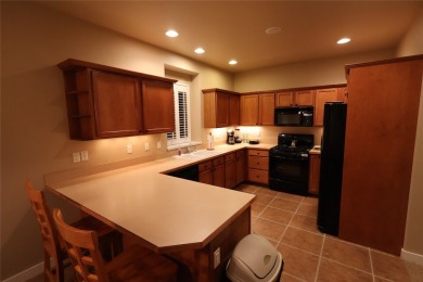 Vaulted ceilings and inspired, open floorplan 4 bedroom 3 full on Eagle Bend Golf Course in Montana - for sale on GolfHomes.com, golf home, golf lot