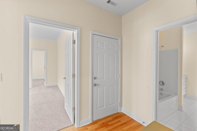 Discover the perfect blend of comfort and scenic beauty at on The Club at Shoal Creek Golf Course in Georgia - for sale on GolfHomes.com, golf home, golf lot