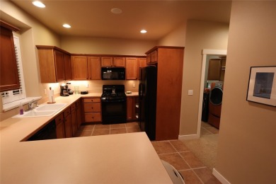Vaulted ceilings and inspired, open floorplan 4 bedroom 3 full on Eagle Bend Golf Course in Montana - for sale on GolfHomes.com, golf home, golf lot