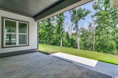 Welcome to this stunning new construction home in the on Wild Wing Plantation in South Carolina - for sale on GolfHomes.com, golf home, golf lot