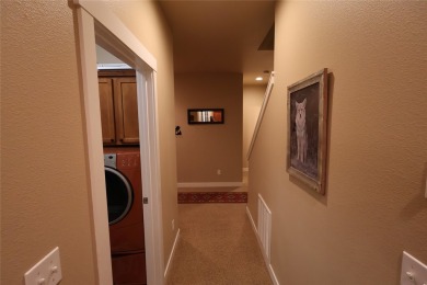 Vaulted ceilings and inspired, open floorplan 4 bedroom 3 full on Eagle Bend Golf Course in Montana - for sale on GolfHomes.com, golf home, golf lot