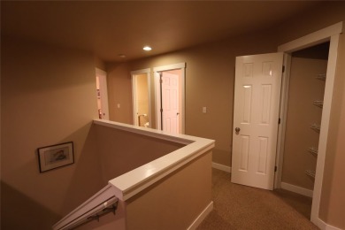 Vaulted ceilings and inspired, open floorplan 4 bedroom 3 full on Eagle Bend Golf Course in Montana - for sale on GolfHomes.com, golf home, golf lot