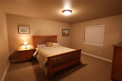 Vaulted ceilings and inspired, open floorplan 4 bedroom 3 full on Eagle Bend Golf Course in Montana - for sale on GolfHomes.com, golf home, golf lot