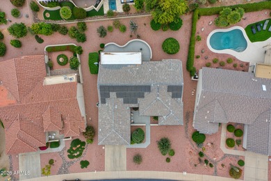 Welcoming one-owner home featuring a charming front courtyard on Sun City Grand Golf Couse and Club in Arizona - for sale on GolfHomes.com, golf home, golf lot