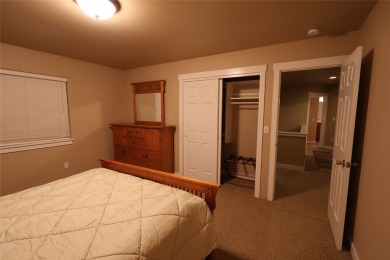 Vaulted ceilings and inspired, open floorplan 4 bedroom 3 full on Eagle Bend Golf Course in Montana - for sale on GolfHomes.com, golf home, golf lot