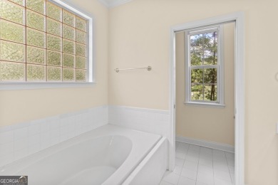 Discover the perfect blend of comfort and scenic beauty at on The Club at Shoal Creek Golf Course in Georgia - for sale on GolfHomes.com, golf home, golf lot