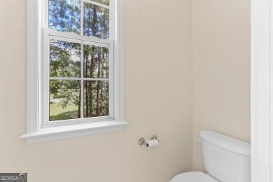 Discover the perfect blend of comfort and scenic beauty at on The Club at Shoal Creek Golf Course in Georgia - for sale on GolfHomes.com, golf home, golf lot