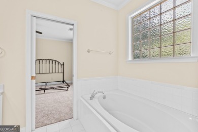 Discover the perfect blend of comfort and scenic beauty at on The Club at Shoal Creek Golf Course in Georgia - for sale on GolfHomes.com, golf home, golf lot