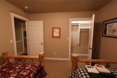 Vaulted ceilings and inspired, open floorplan 4 bedroom 3 full on Eagle Bend Golf Course in Montana - for sale on GolfHomes.com, golf home, golf lot