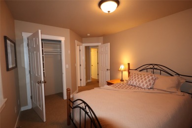 Vaulted ceilings and inspired, open floorplan 4 bedroom 3 full on Eagle Bend Golf Course in Montana - for sale on GolfHomes.com, golf home, golf lot